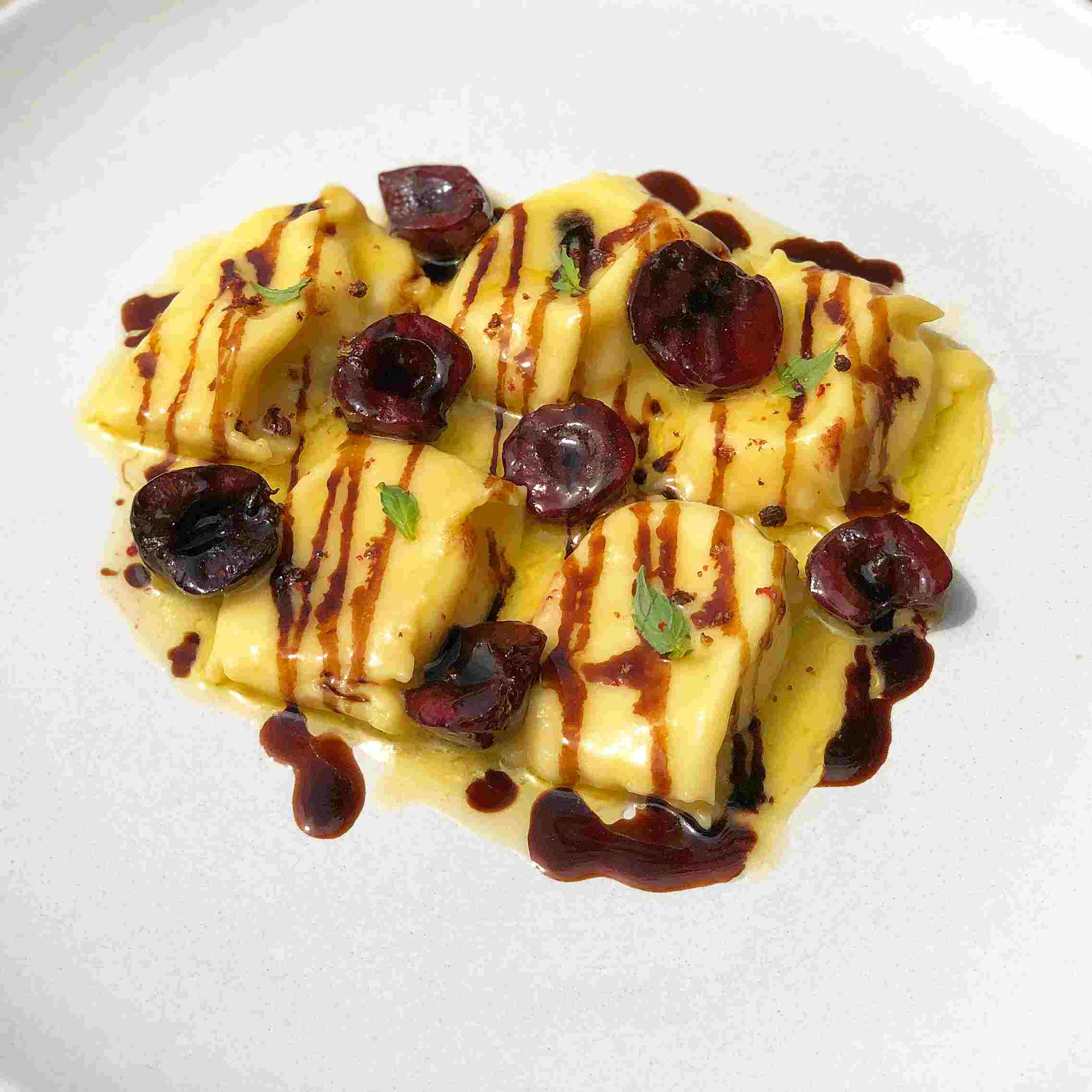 cheese agnolotti with cherries and balsamic